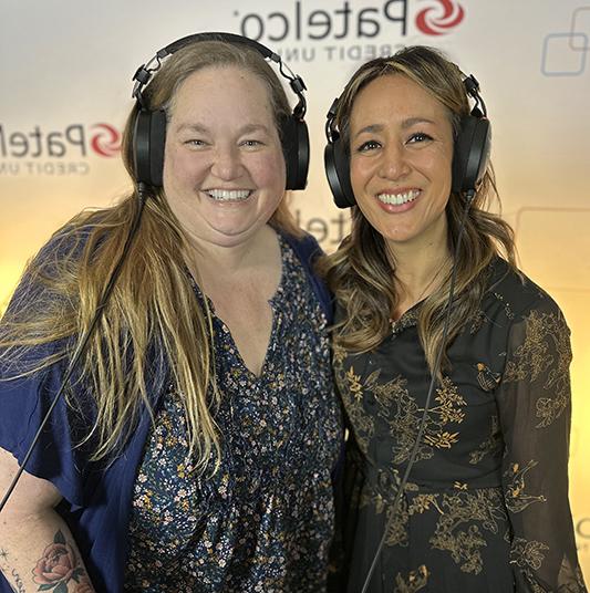 Patelco Employees Michele Enriquez and Melissa Steed at the podcast desk.